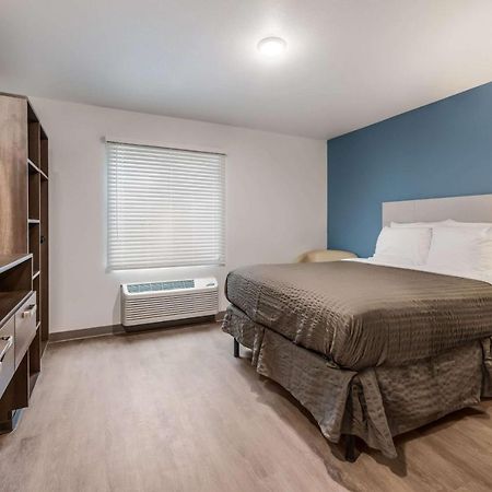 Woodspring Suites Charlotte - University Research Park Exterior foto